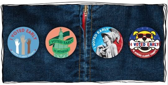 Four finalist designs laid out on a blue denim jacket