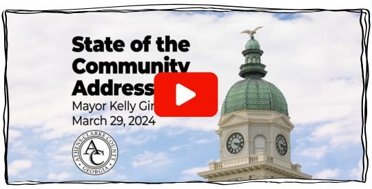City Hall dome against a blue sky with clouds