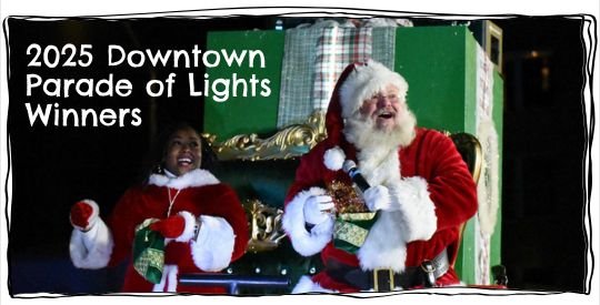 Mrs. and Mr. Clause on the float at the end of the parade