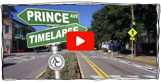 Looking down Prince Avenue with a street sign in the foreground