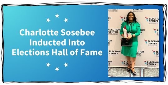 Elections Director Charlotte Sosebee holding trophy