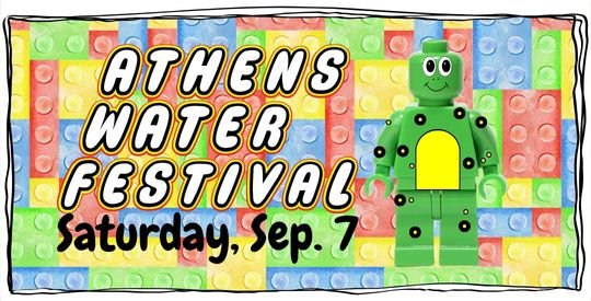 Lego-style frog figure on an interlocking brick background