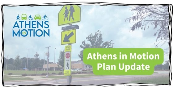 A pedestrian street crossing with text on top