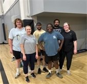 Athens-Clarke County Employee Volleyball team 'Winded Energy' pose after tournament