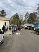 People in line for a pet vaccine clinic