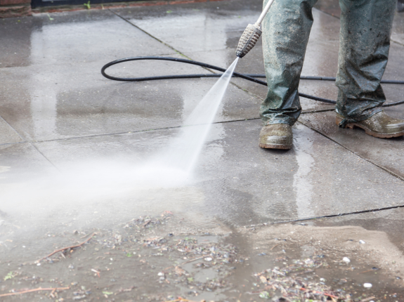 Pressure washing on pavement