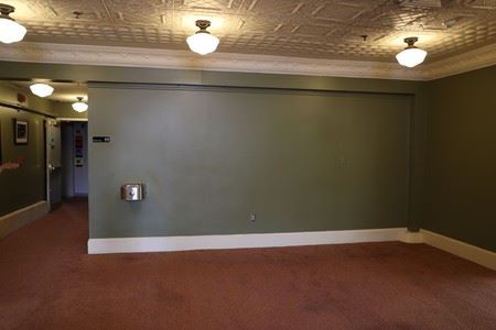 Picture of the Morton Theatre lobby area for a call for public art