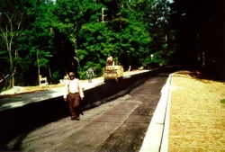 Work crew resurfacing a street
